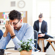 young-frustrated-businessman-with-smartphone-worki-GS4BDEL Blog